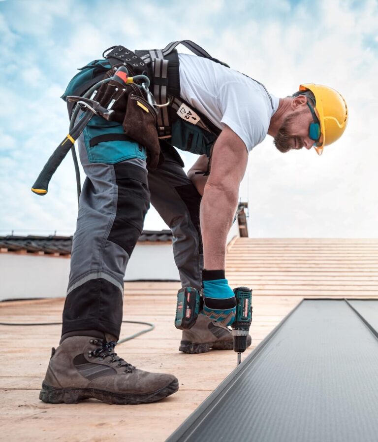 construction worker working on roof